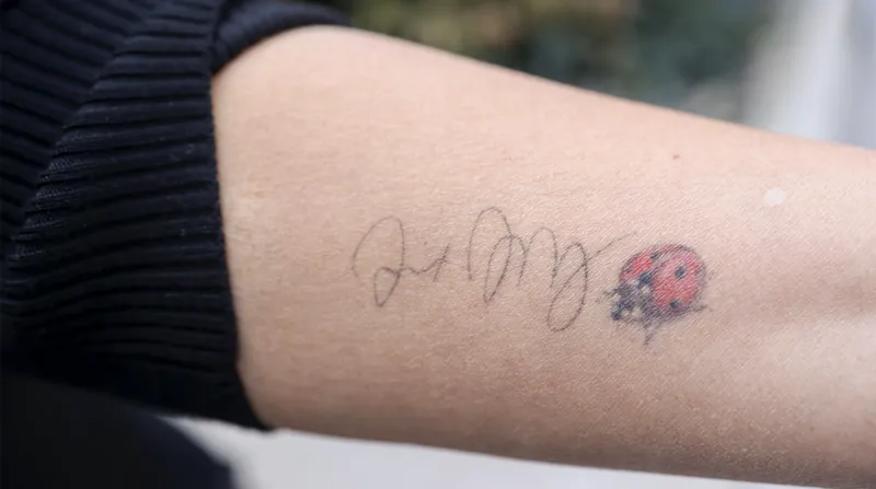 Memorial tattoo with ashes